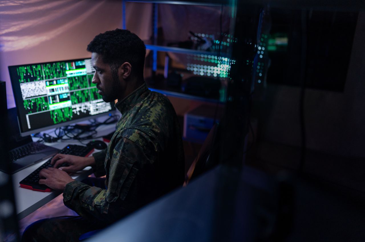 us military man at computer