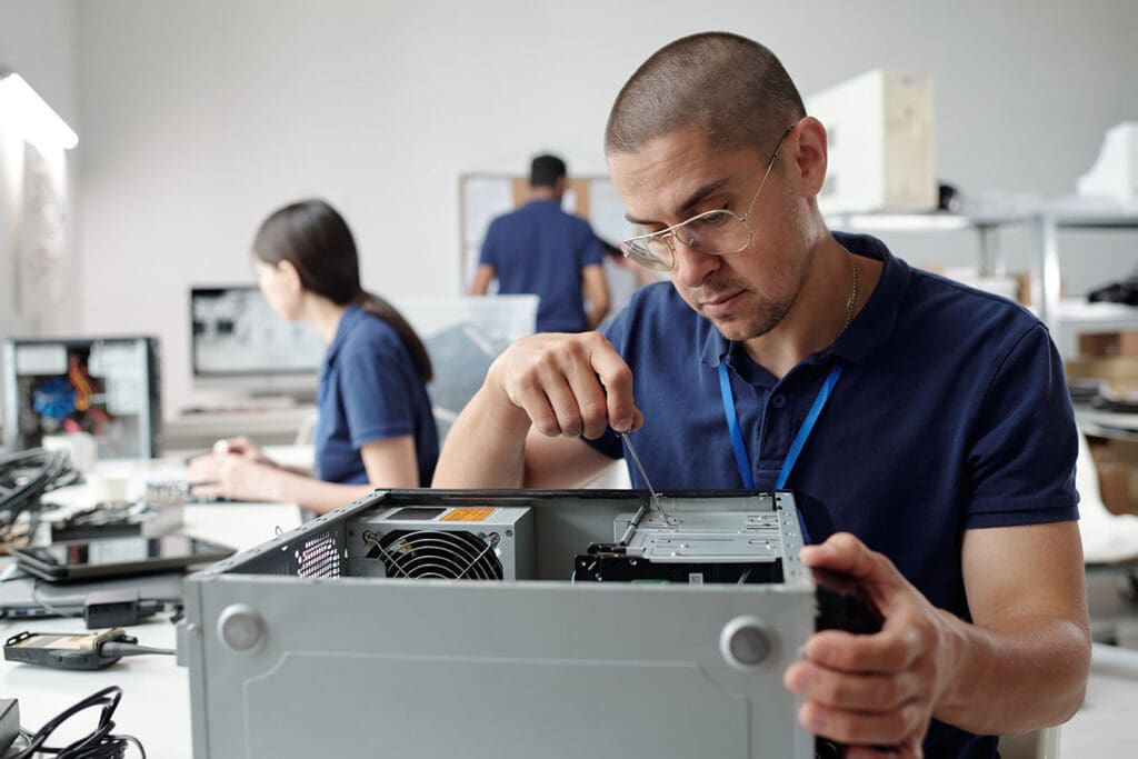 technician-assembling-a-new-computer-during-a-hardware-update